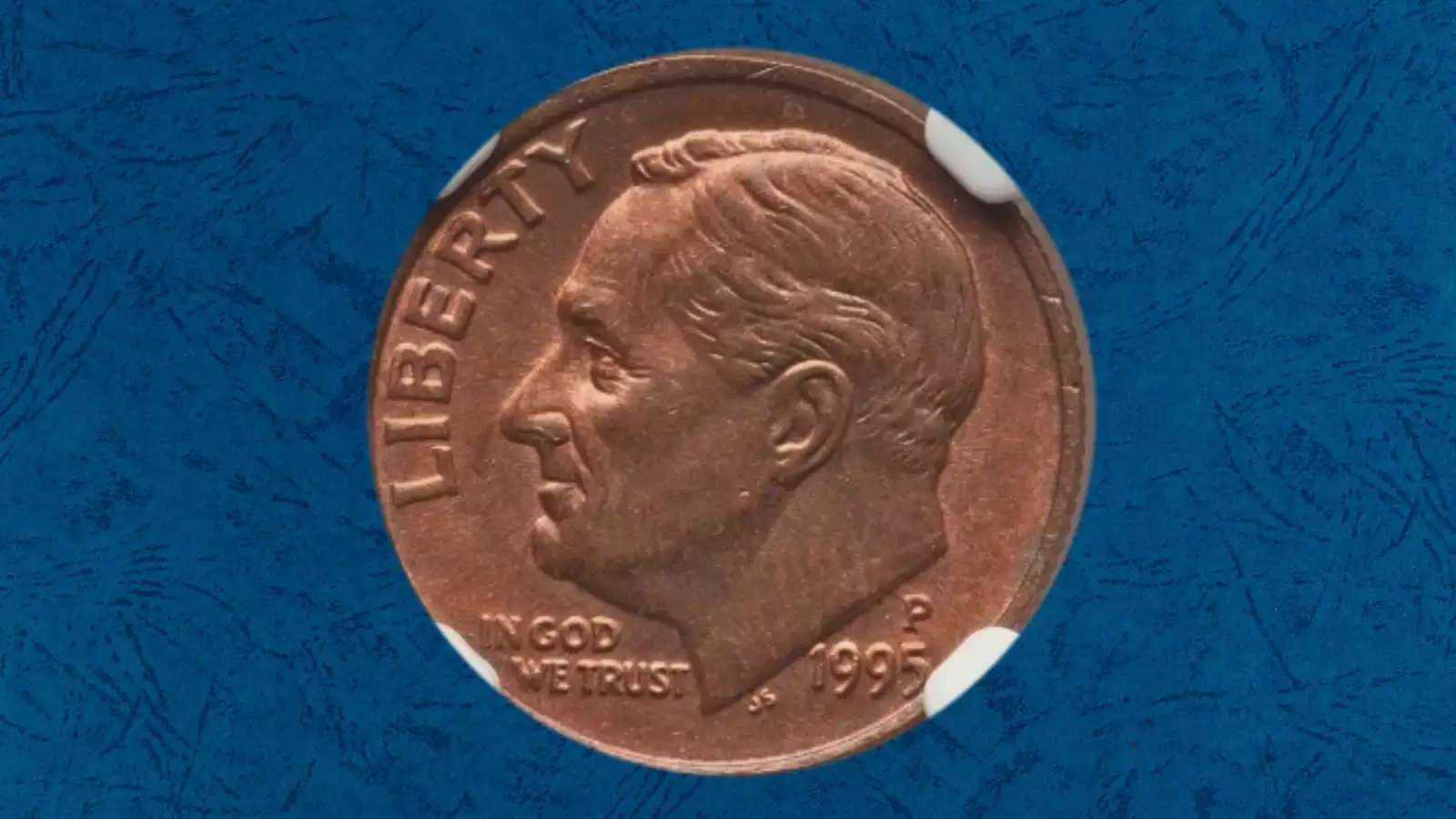 1995 Roosevelt dime missing clad layer error showing copper-colored surface instead of nickel exterior